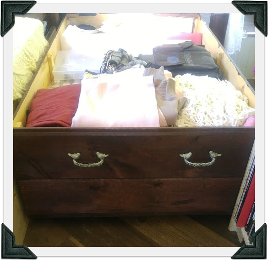 The humungous rolling drawer I built for under our bed